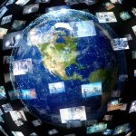 A conceptual image of with video screenhots of various stories encircling the globe.