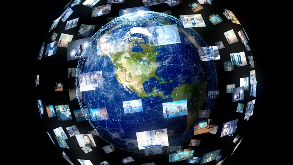 A conceptual image of with video screenhots of various stories encircling the globe.